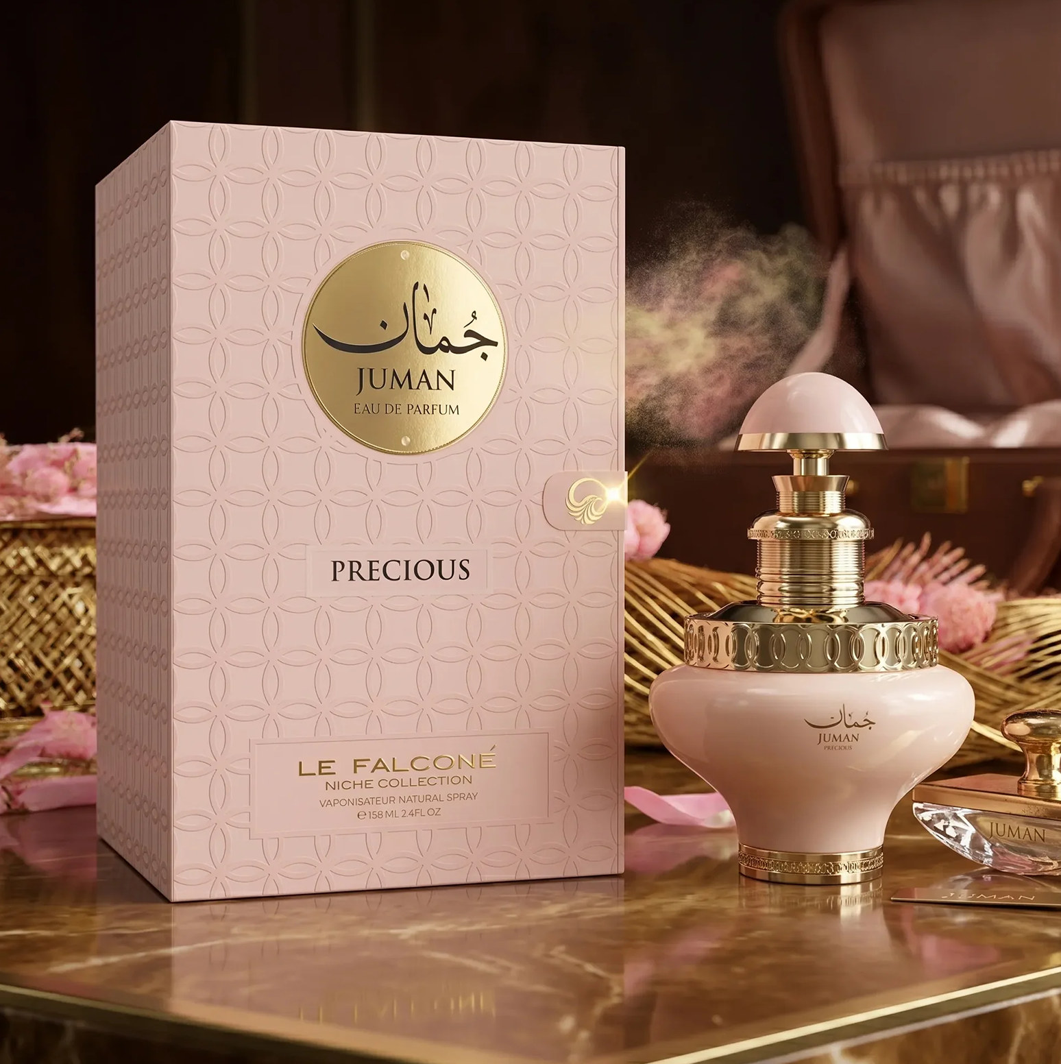 A luxurious product presentation of Juman Precious Eau de Parfum, featuring the soft-toned 100ml bottle displayed beside its ornate, patterned gift box on an elegant marble surface.